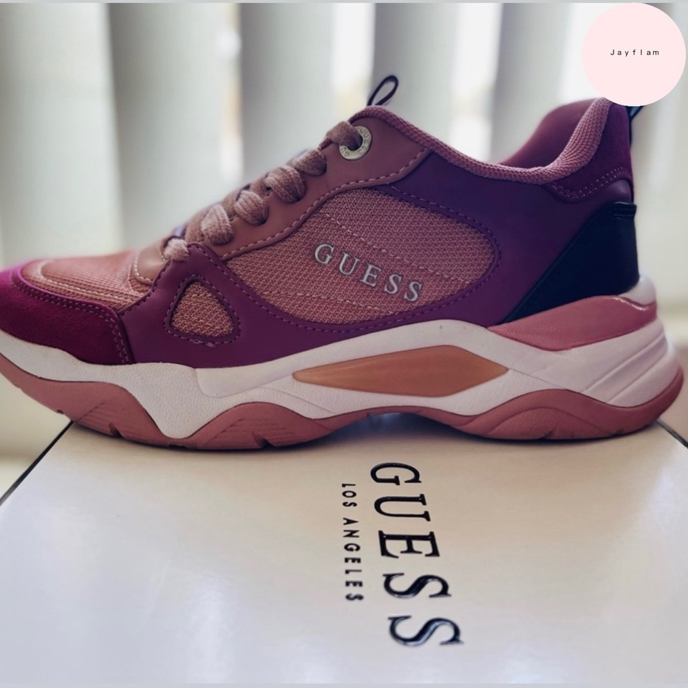pink multi fabric sneaker by Guess.